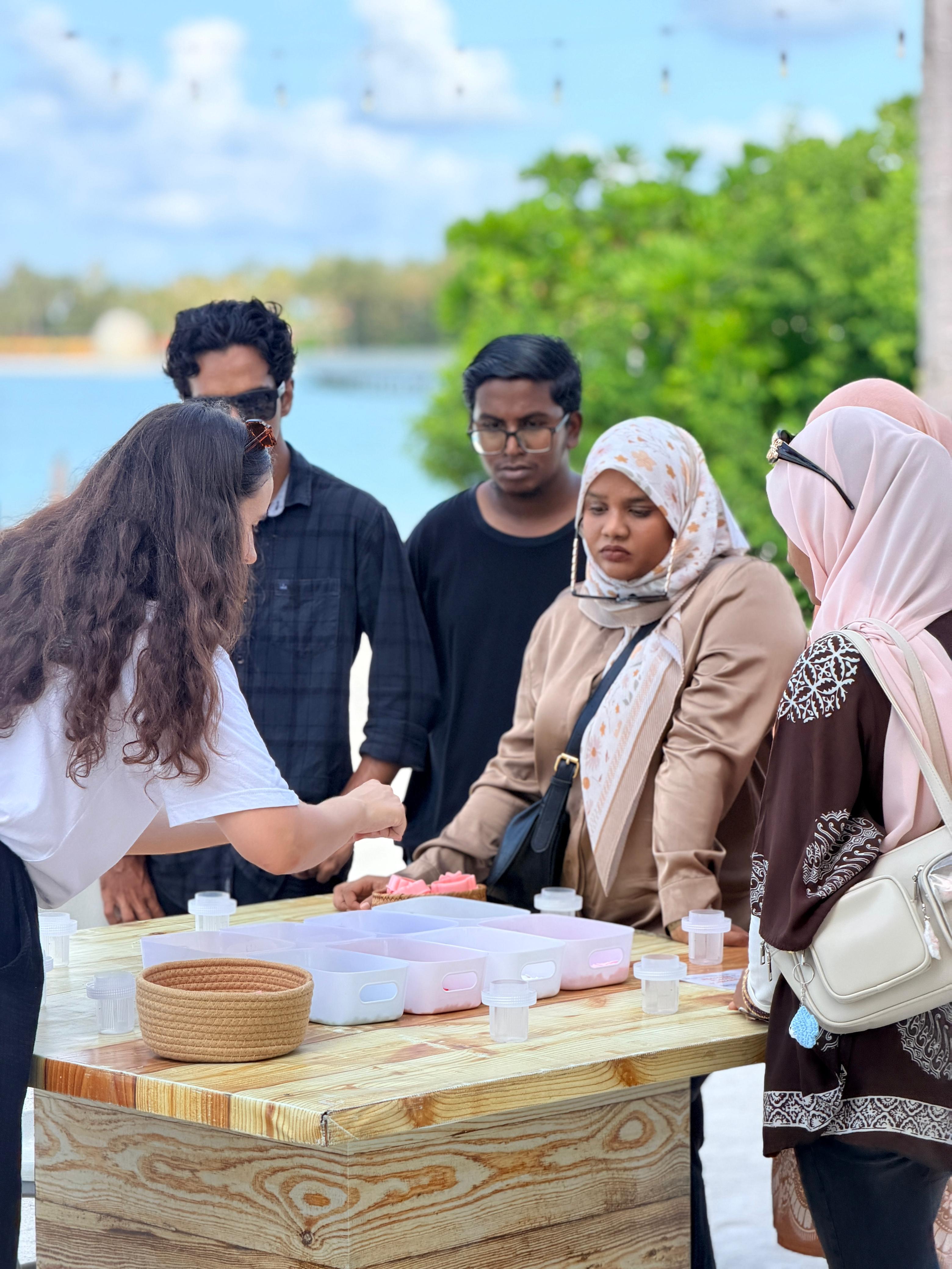 University students learning about plastic recycling